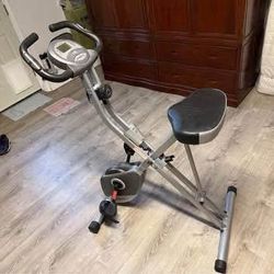 Foldable exercise bike with pulse and screen, 8 levels of resistance.