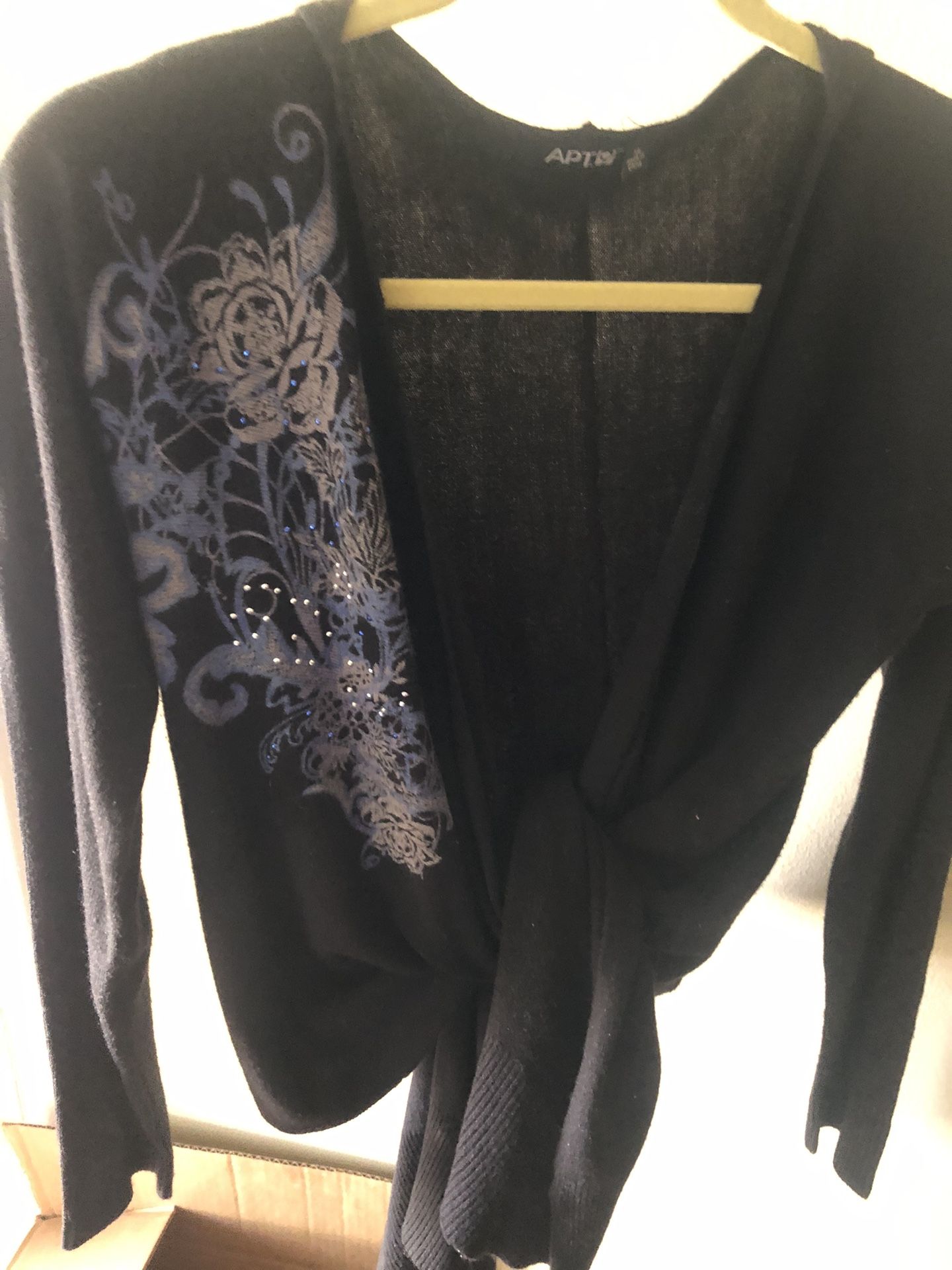 Lovely Black Soft Knit Sweater With Blue Design On One Side