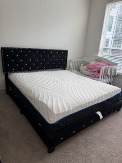 King size bed with mattress for sale.