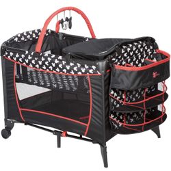 Disney Mickey Sweet Wonder Playard, Foldable Baby Playpen: With Newborn Bassinet, Toy Arch, and Carry Bag, Mickey Silhouette