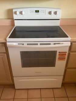 Title: Unused Amana Electric Stove & Oven – White