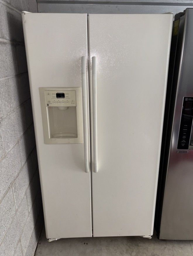 White GE Refrigerator And Freezer
