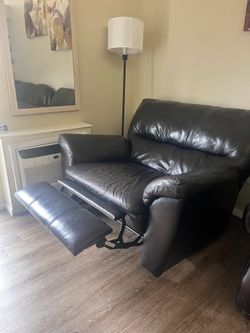 Brown Leather Reclining Sofa
