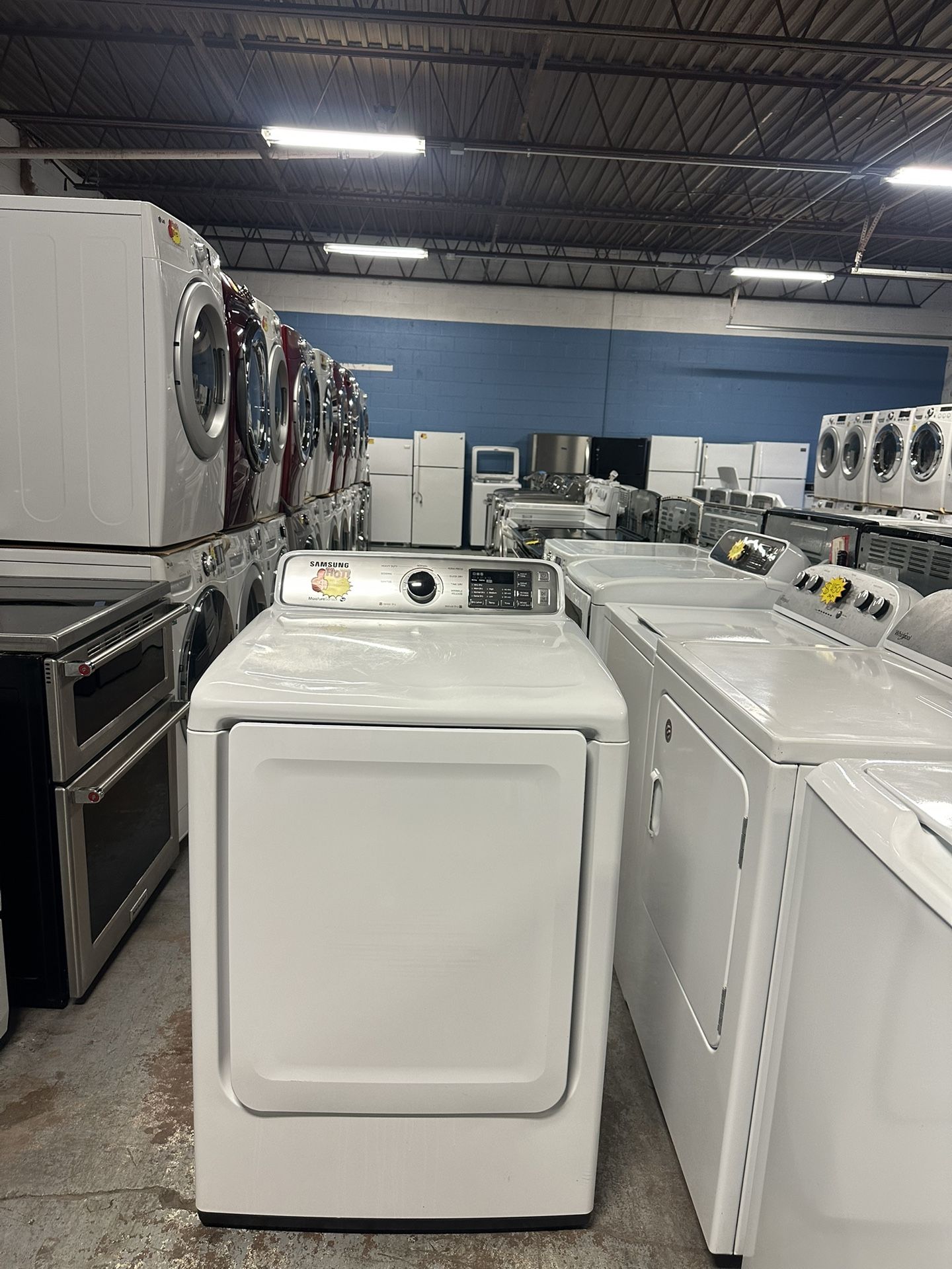 Samsung) Electric Dryer: Everything works perfectly, is spotless, and comes with a warranty.