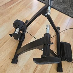 Indoor bike trainer.  Magnetic block stand with front wheel riser  for cycling exercise. 8 resistance levels provides a realistic cycling feel. 