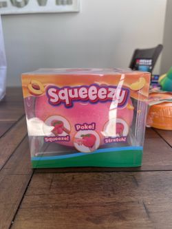 Squeeezy Squishy Peach (AUTHENTIC)