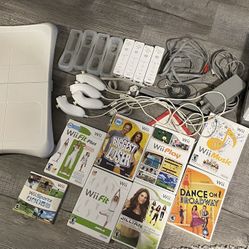 Huge Nintendo Wii lot for fitness 4 controllers and games!!