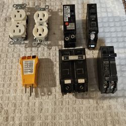  ELECTRICAL SUPPLIES (CIRCUIT BREAKERS, OUTLETS & AN ELECTRICAL RECEPTACLE TESTER)