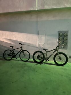 2 bikes , one normal bike , one ebike