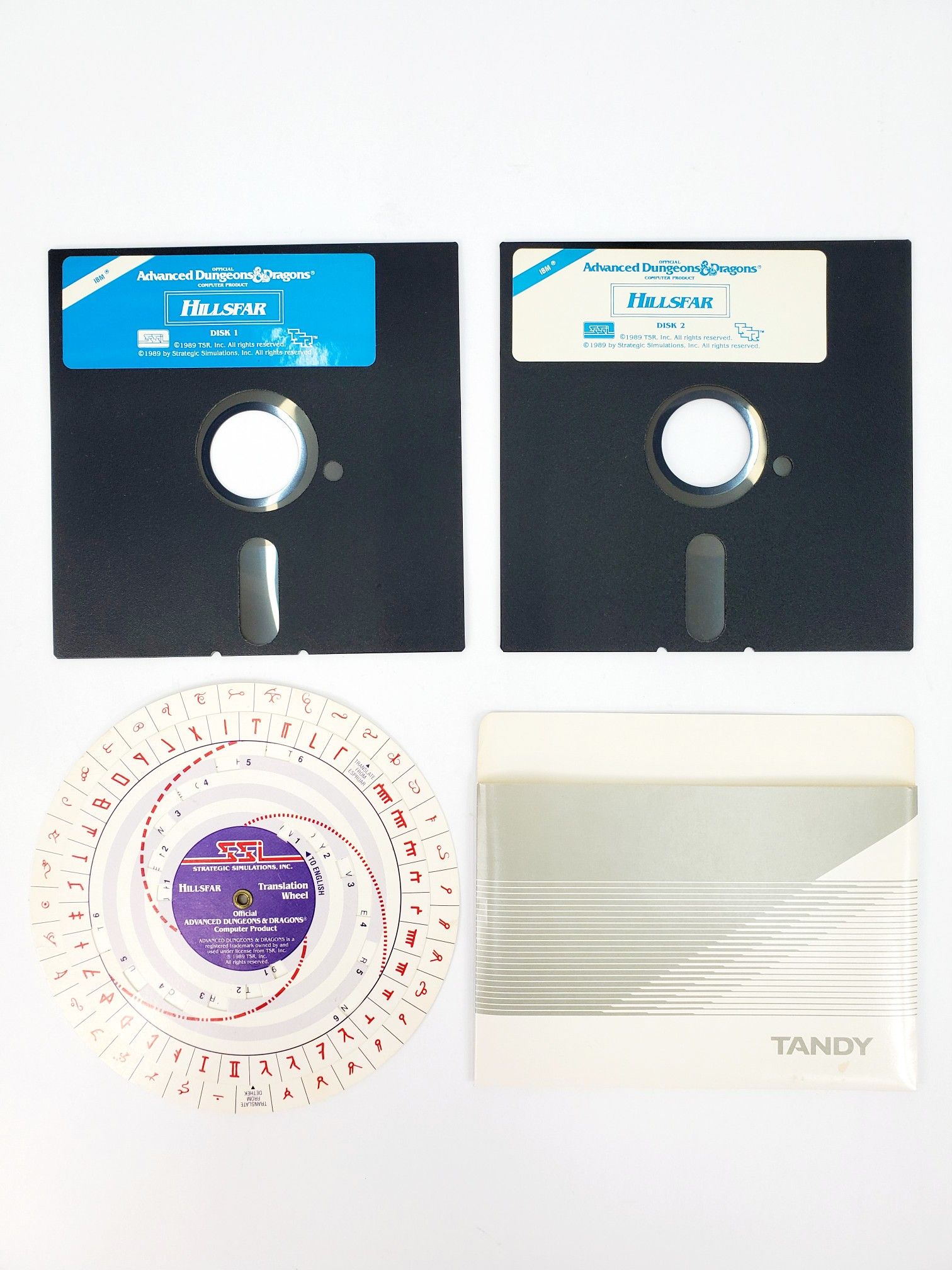 AD&D SSI Hillsfar - 5.25" Floppy Disks & Translation Wheel (1989) - IBM PC Tandy