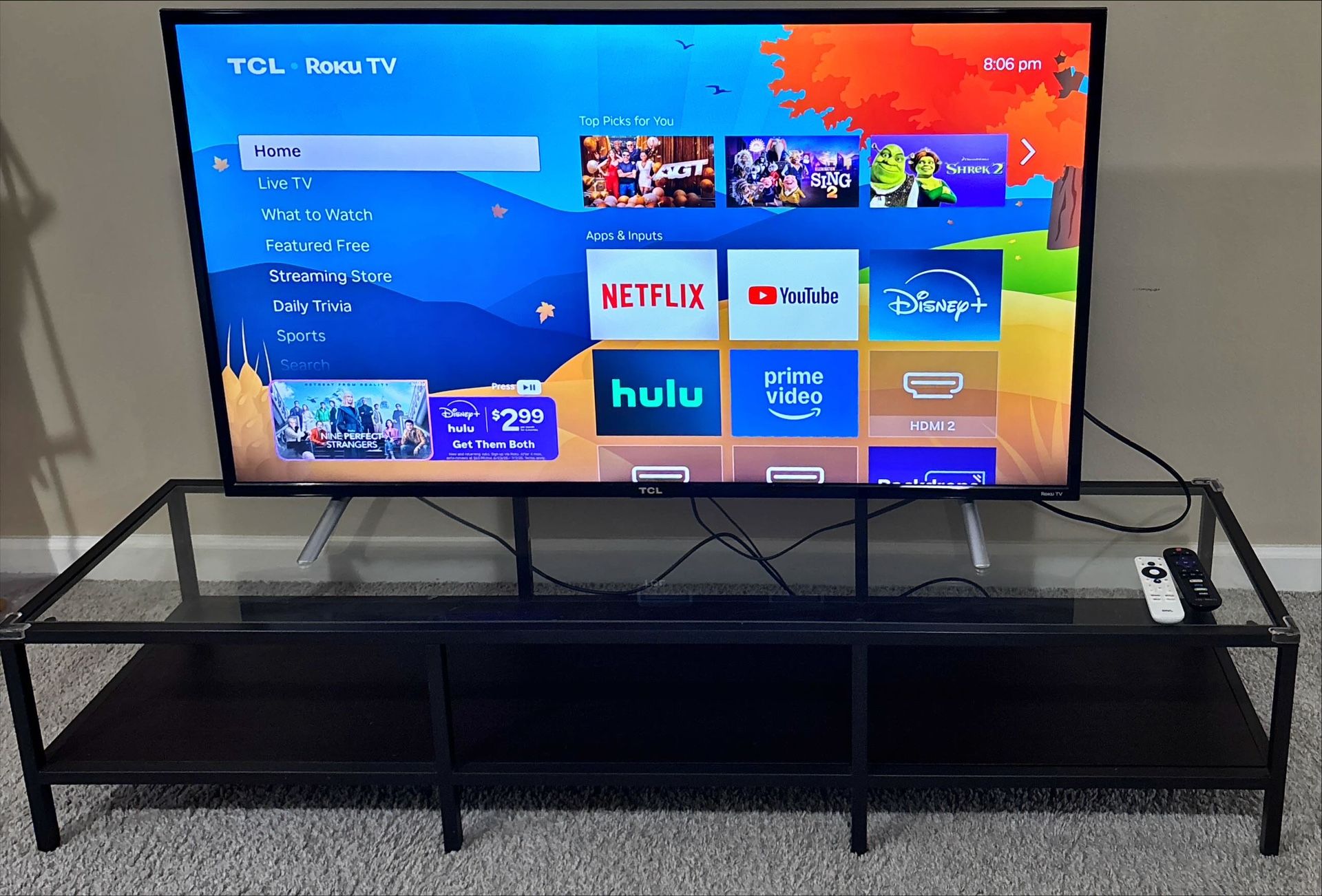 TCL TV (Roku And 4K) With Table