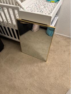 Mirror with gold frame
