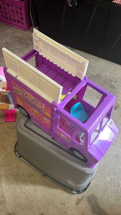 12 Barbies and stove stroller store basket more stuff..