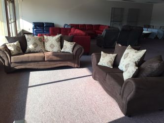 Brown sofa and loveseat