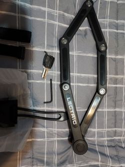Ebike or scooter folding lock