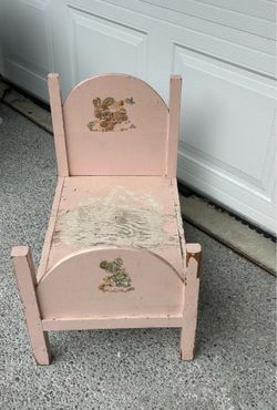 Vintage wooden doll bed