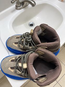 High-Top Sneakers with Blue Sole