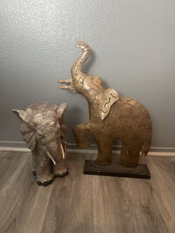 Wood and metal elephant statues