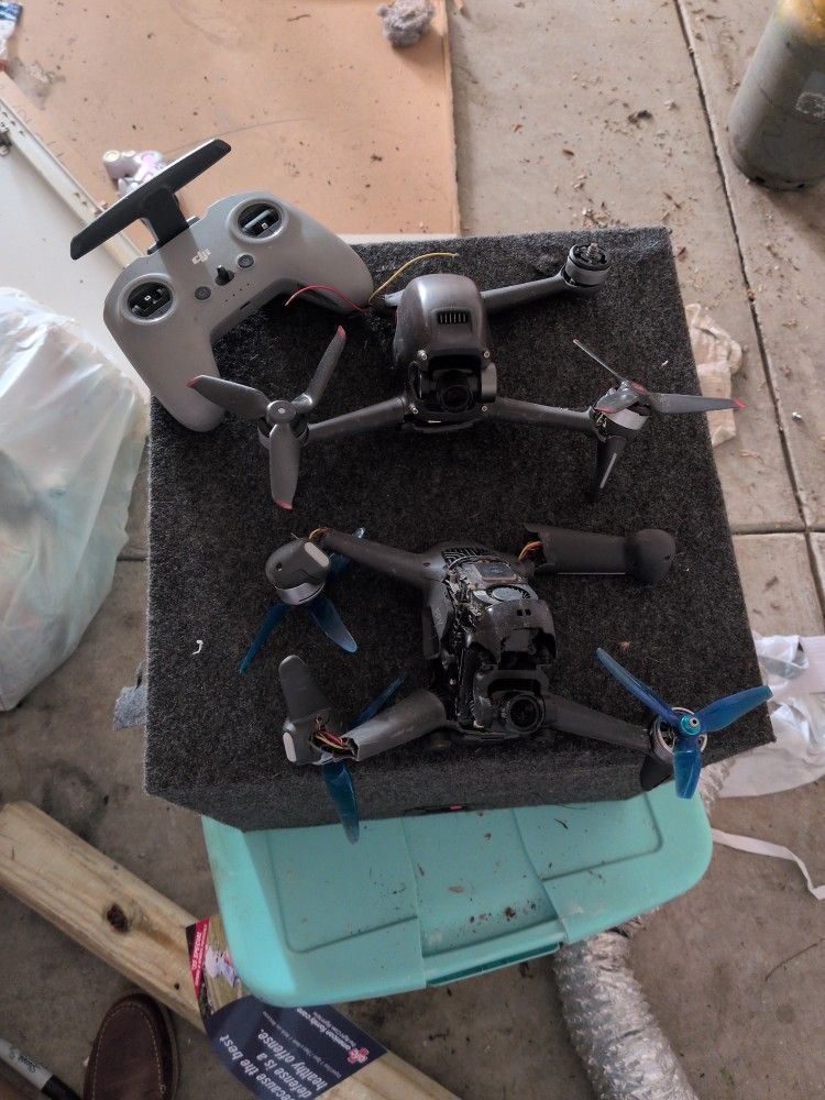 (2)!DJI FPV DRONES ( FOR PARTS) AND RC2 CONTROLLER