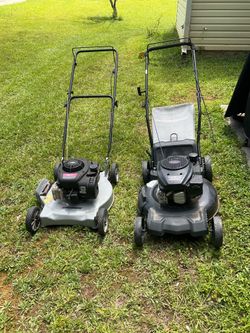 2 Non Working Lawnmowers good for parts