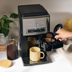 New Cuisinart Custom Grind & Brew Single-Cup Coffee Maker. Sells at costco for $170 plus tax.