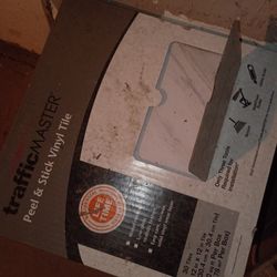 Traffic Master tiles 4 boxes