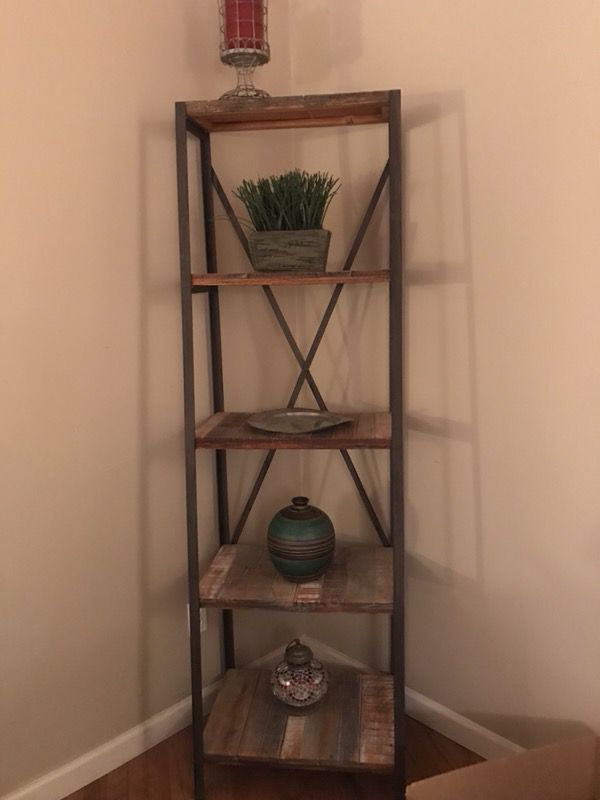 Display shelf, wood/metal. Shelves get gradually smaller from bottom to top. Good condition. $115.