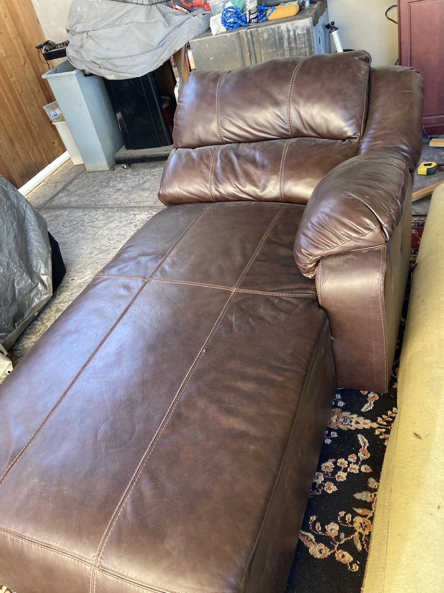 Brown lounge chair, leather like