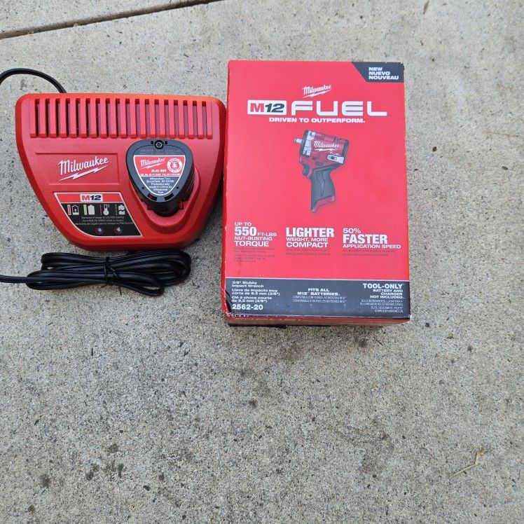 Milwaukee 12v Fuel Stubby Impact Wrench 3/8 Includes Battery And Charger Brand New
