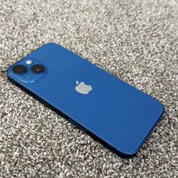 I phone 13 blue with airpods and charger