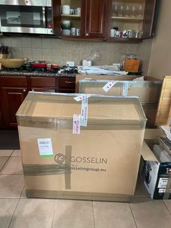 8 large Moving boxes and packing paper