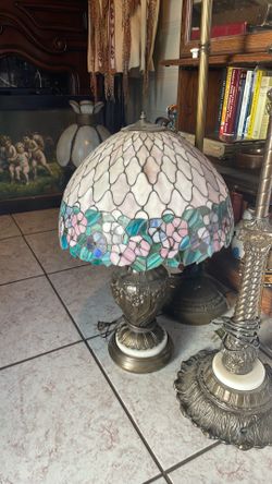 Stained glass Tiffany style lamp with embossed base and marble on the bottom