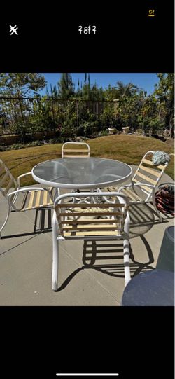 Outdoor patio table with chairs