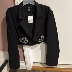 A black blazer from Forever 21 with a rhinestone heart embellishment.$25 Great For Prom Day 