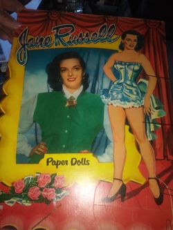 1955 original Jane Russell paper dolls. Uncut and complete but cover shows age, as do pages.. Doll on cover page trying to detache.