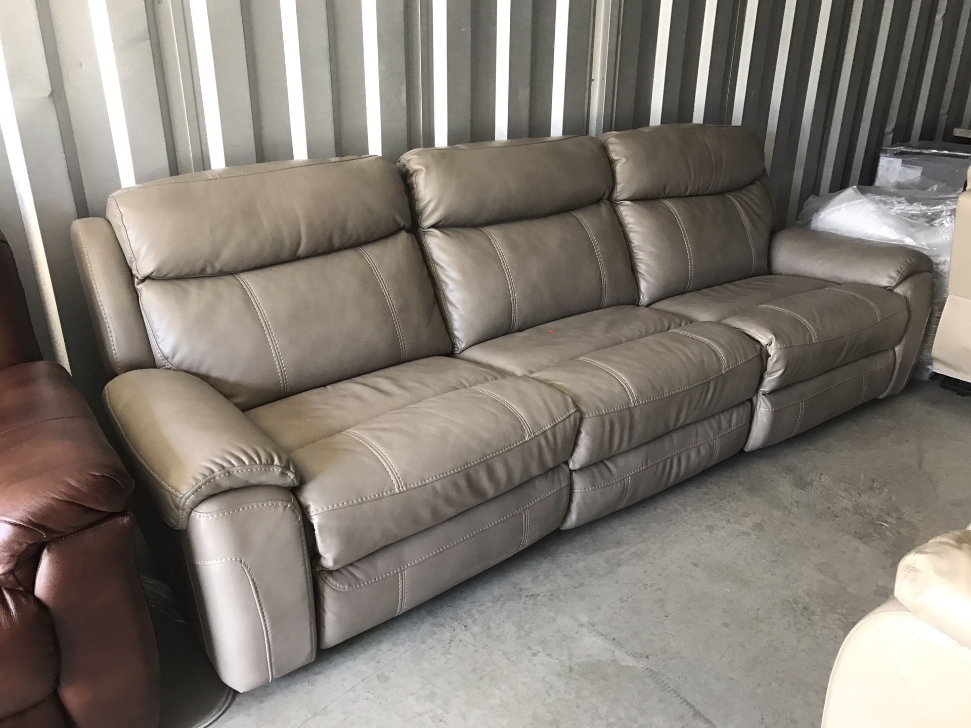 Brand new gray leather sectional couch