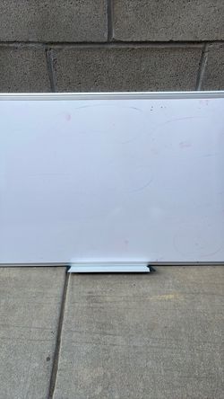 Small white board with aluminum frame
