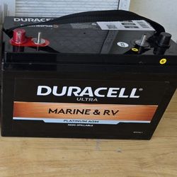 DURACELL 110 AGM BATTERY AND 10 VOLT X 2 BATTERY CHARGER