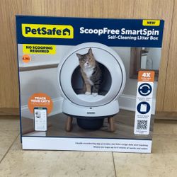 PETSAFE SCOOP FREE SMART SPIN SELF-CLEANING LITTER BOX.