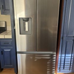 Samsung Model RF22A4221SR - 22 cu. ft. Standard Depth 3-Door French Door Smart Refrigerator in Fingerprint Resistant Stainless Steel with Dispenser