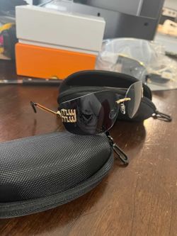 Miu miu woman glasses