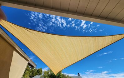 Triangle shade sails. 3 available. $15 each.
