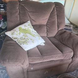3 couches and a dining table