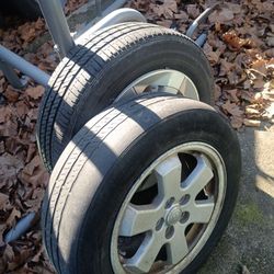 set of 4 Prius rim and tires two tires like brand new two very low tread
