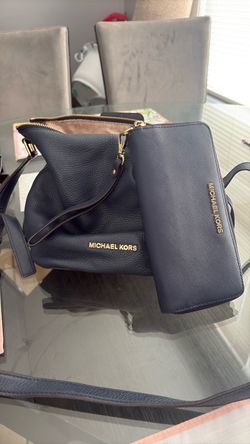 Navy leather Michael Kors crossbody with matching wallet