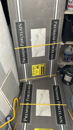 Tile porcelain 24”x48” 112 square feet and porcelain mosaic 13 square feet