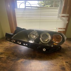 2007 Mazda 3 left driver halogen OEM headlight