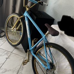 sky blue and gold throne bmx 