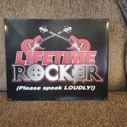 2004 "LIFETIME ROCKER PLEASE SPEAK LOUDLY" TIN SIGN 15" x 12".