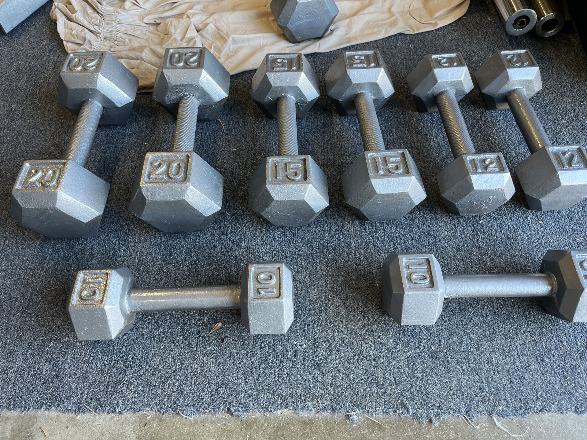 Set of dumbbell weights 20,15,12,10 lbs